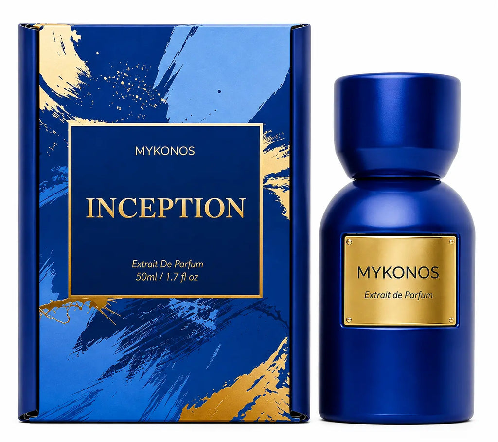 A bottle of MYKONOS Inception Extrait De Parfum in a deep blue bottle with a gold label, standing next to its matching blue and gold box on a white background. Mykonos Inception Extrait de Parfum 50ml perfume bottle – mystical spicy amber, velvety florals, and rich dark woody fragrance for men and women
