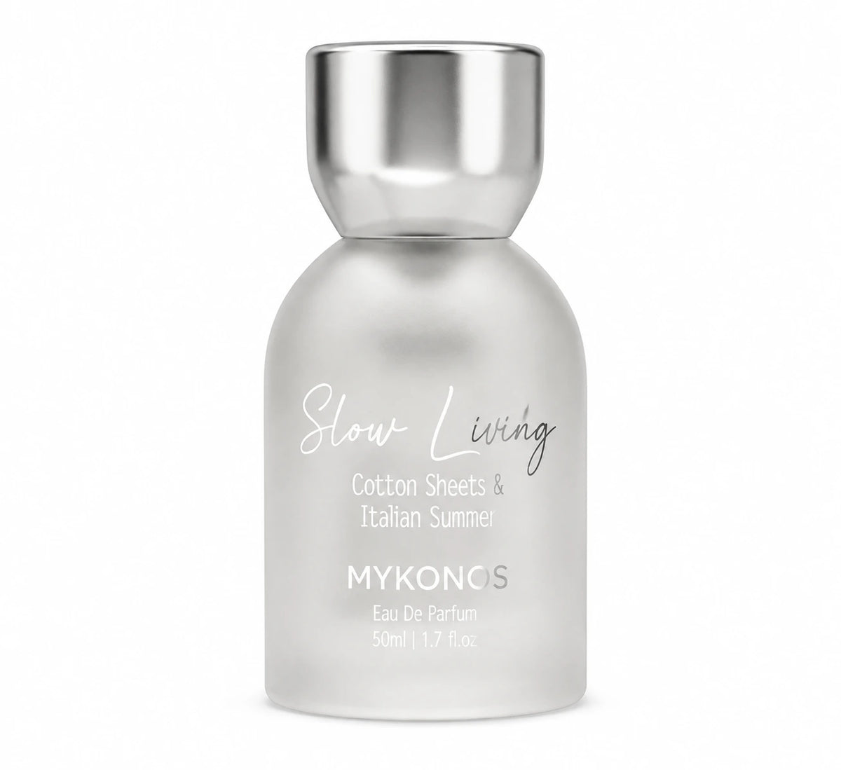 A 50ml bottle of MYKONOS Slow Living Cotton Sheets & Italian Summer Eau De Parfum, featuring a frosted glass body and a metallic silver cap, set against a plain white background. Calming green tea, soft florals, and soothing woody musk fragrance for men and women